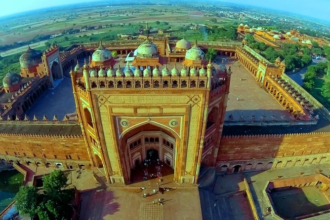 7-Day Golden Triangle & Varanasi Tour from Delhi with Guide - Jaipur by day: City Palace and Hawa Mahal at human speed