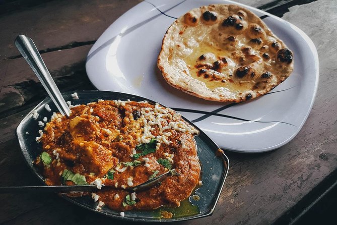 Chandni Chowk Delhi Food Tour with 15+ Tastings - Stop 1: Pasar Chandni Chowk, soaked vadas with yogurt and pomegranate