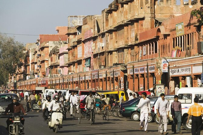 From Delhi: Same Day Amer Fort & Jaipur Tour By Car - Amber Palace (Amer Fort): Golden walls, slopes outside Jaipur, and a temple inside