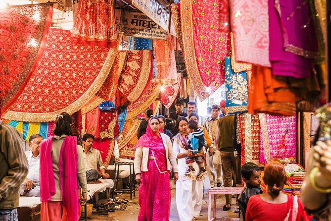 Half Day Delhi Shopping Tour With Shopping Consultant - Connaught Place: where fabrics and traditional showrooms do the heavy lifting