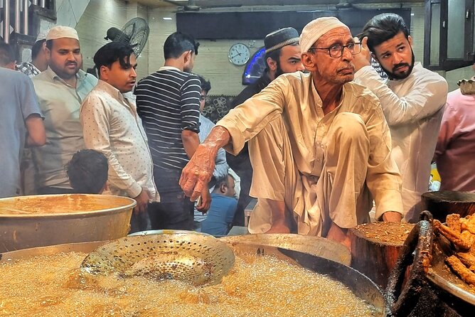 Old Delhi Night Food Tour - Kitchens & Local Stories - Gurudwara Sis Ganj Sahib: a calm reset before the kebabs