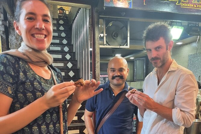 Old Delhi Night Food Tour - Kitchens & Local Stories - Kalan Mehal by night: local favorites, then Mughal-era dessert