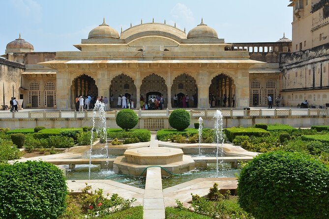 Private Amer Fort and Jaipur City Tour from Delhi By Car - City Palace Museum areas in the Old City, textiles and more